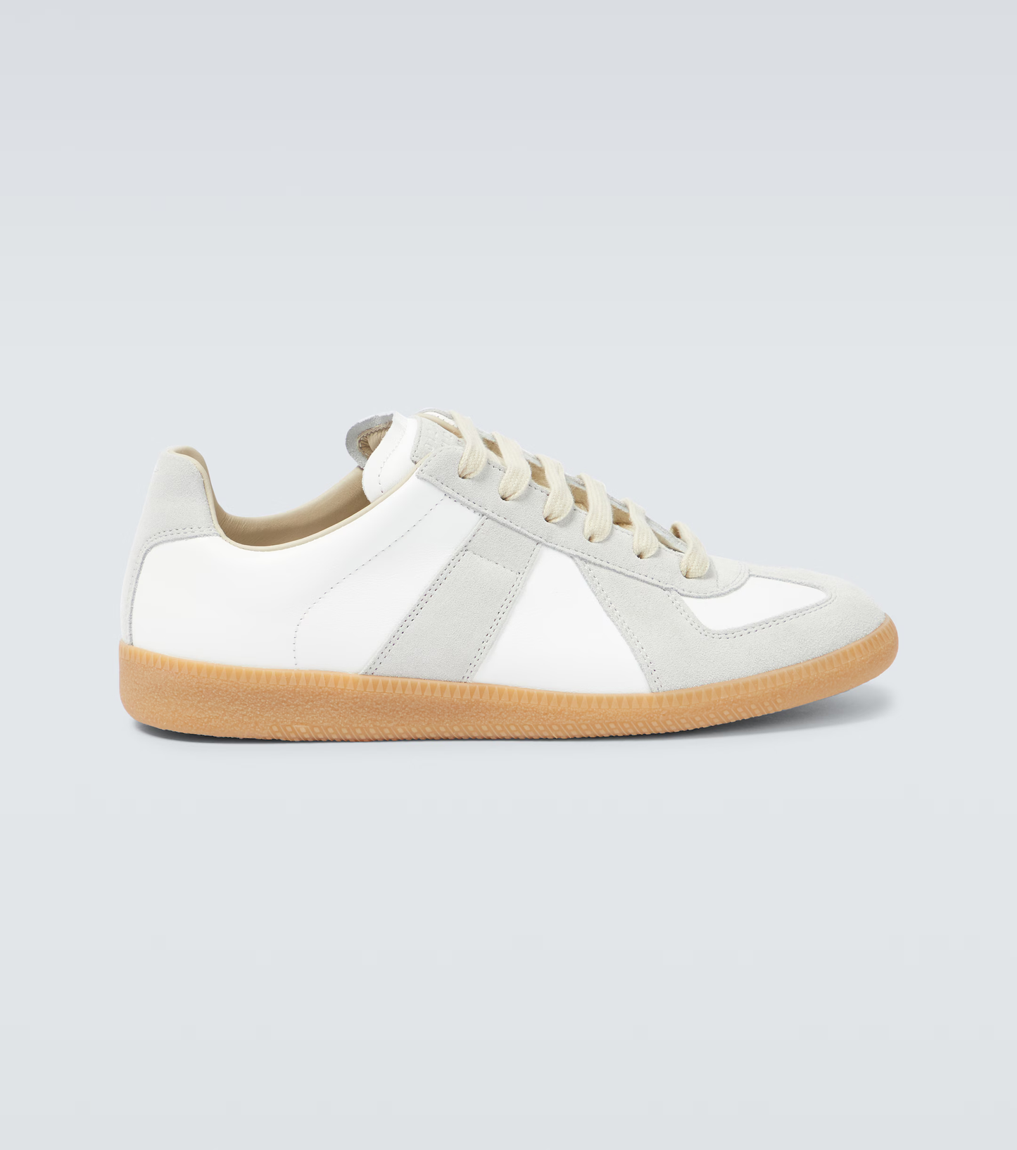 cream german army trainers sneakers
retro maison margiela style shoes
luxury suede panelled trainers
leather minimalist sneakers void packaging