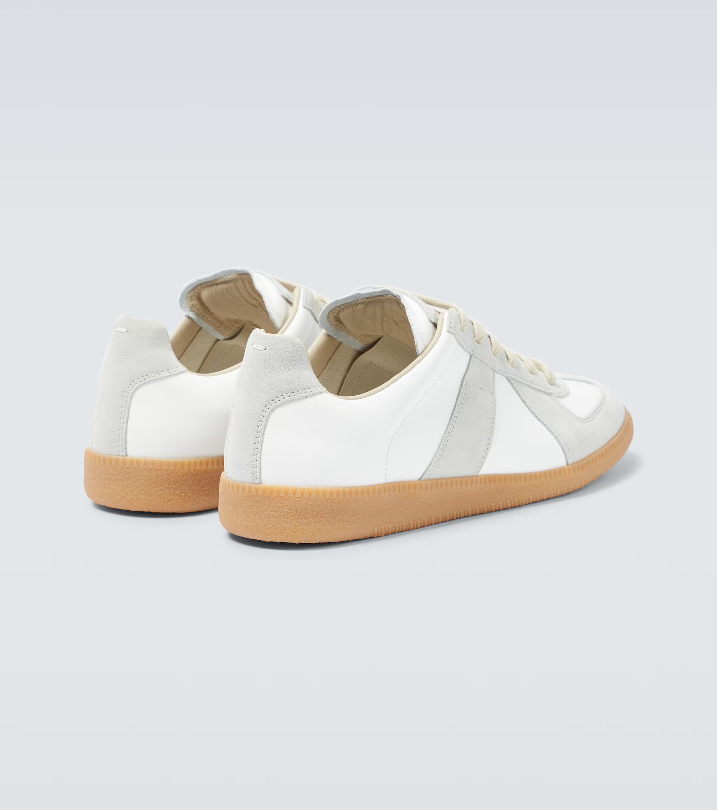 cream german army trainers sneakers
retro maison margiela style shoes
luxury suede panelled trainers
leather minimalist sneakers void packaging