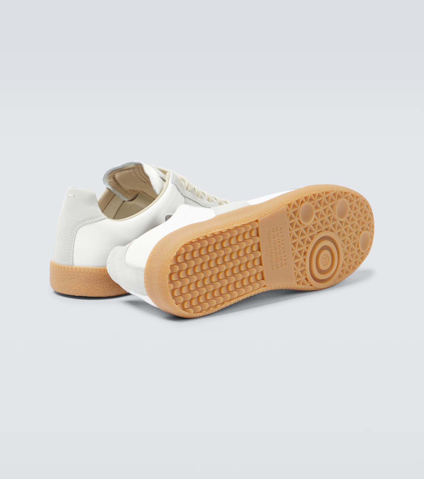 cream german army trainers sneakers
retro maison margiela style shoes
luxury suede panelled trainers
leather minimalist sneakers void packaging