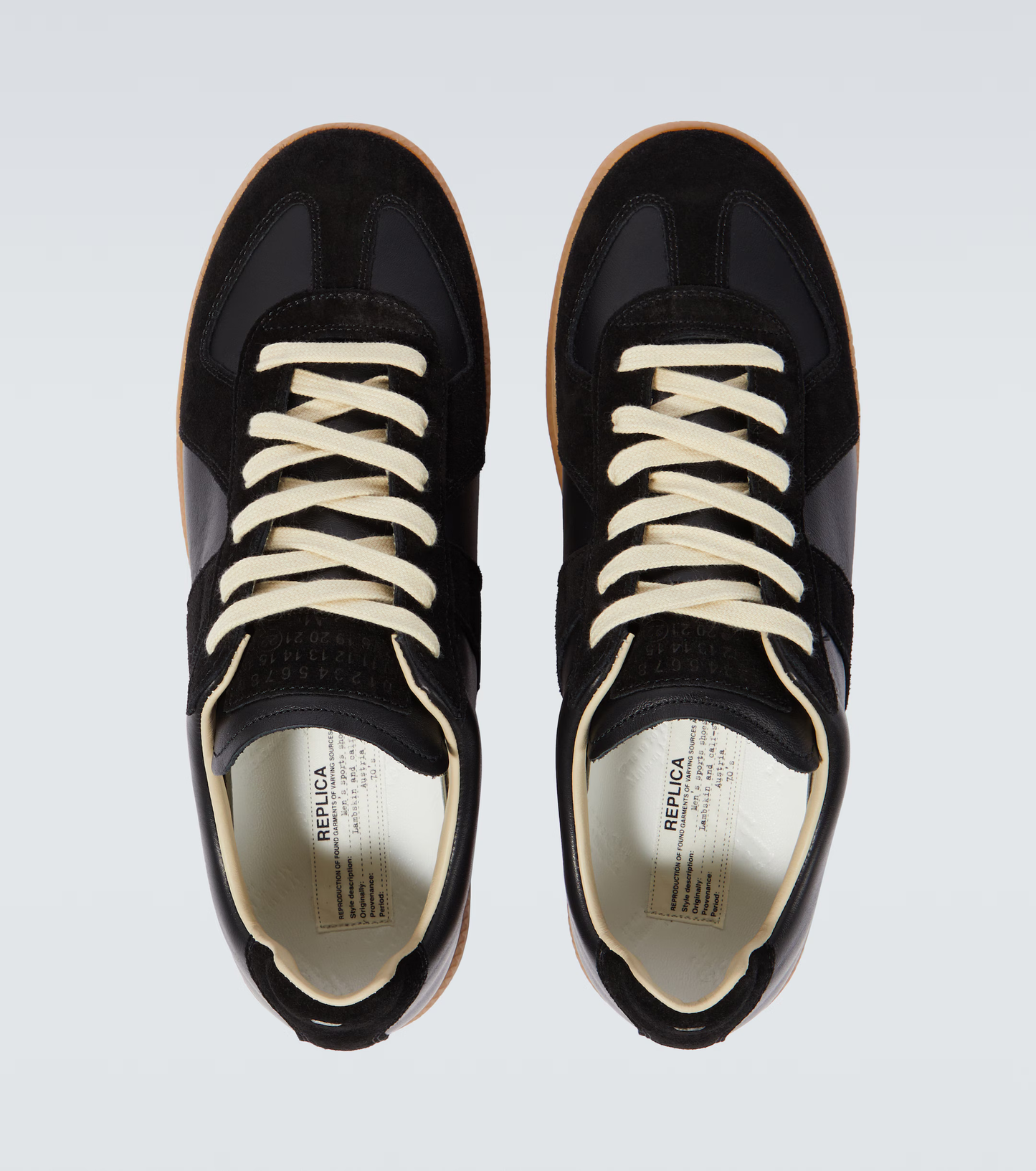 black & orange german army trainers sneakers
retro maison margiela style shoes
luxury suede panelled trainers
leather minimalist sneakers void packaging