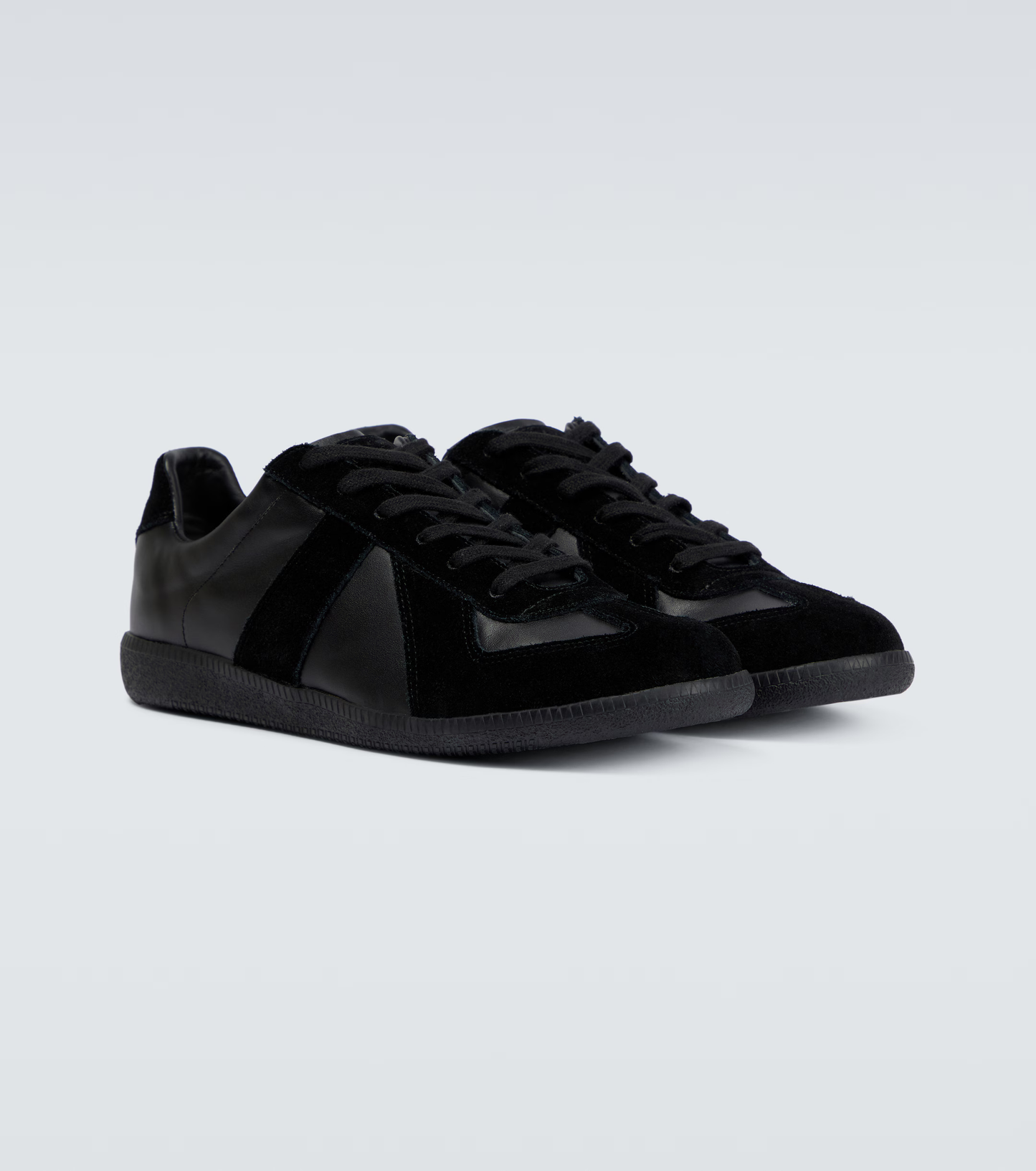 black german army trainers sneakers
retro maison margiela style shoes
luxury suede panelled trainers
leather minimalist sneakers void packaging