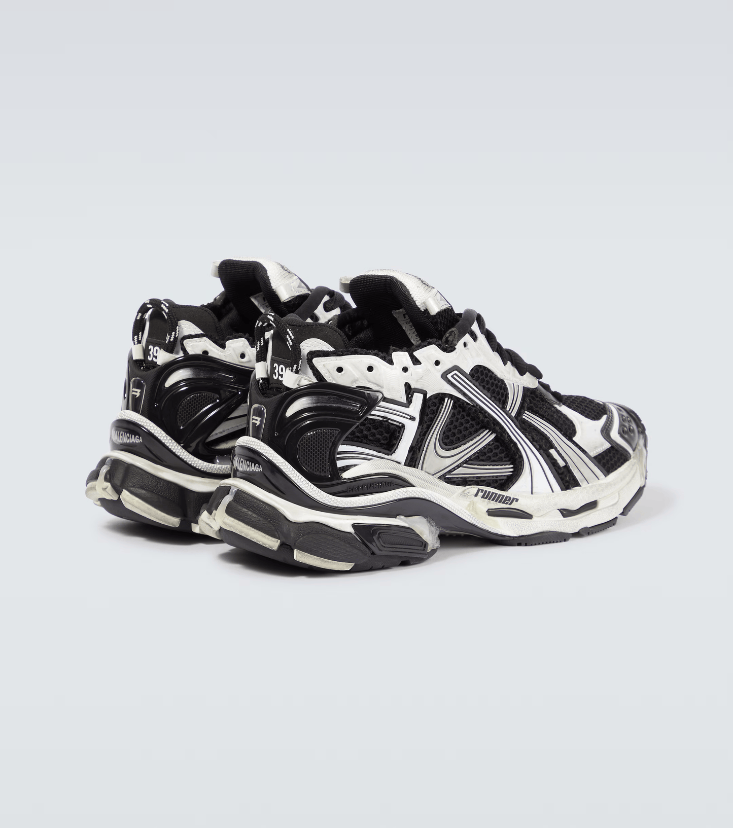 distressed white & black mesh runner sneakers
vintage luxury style running shoes
grey deconstructed street sneakers
balenciaga inspired runners