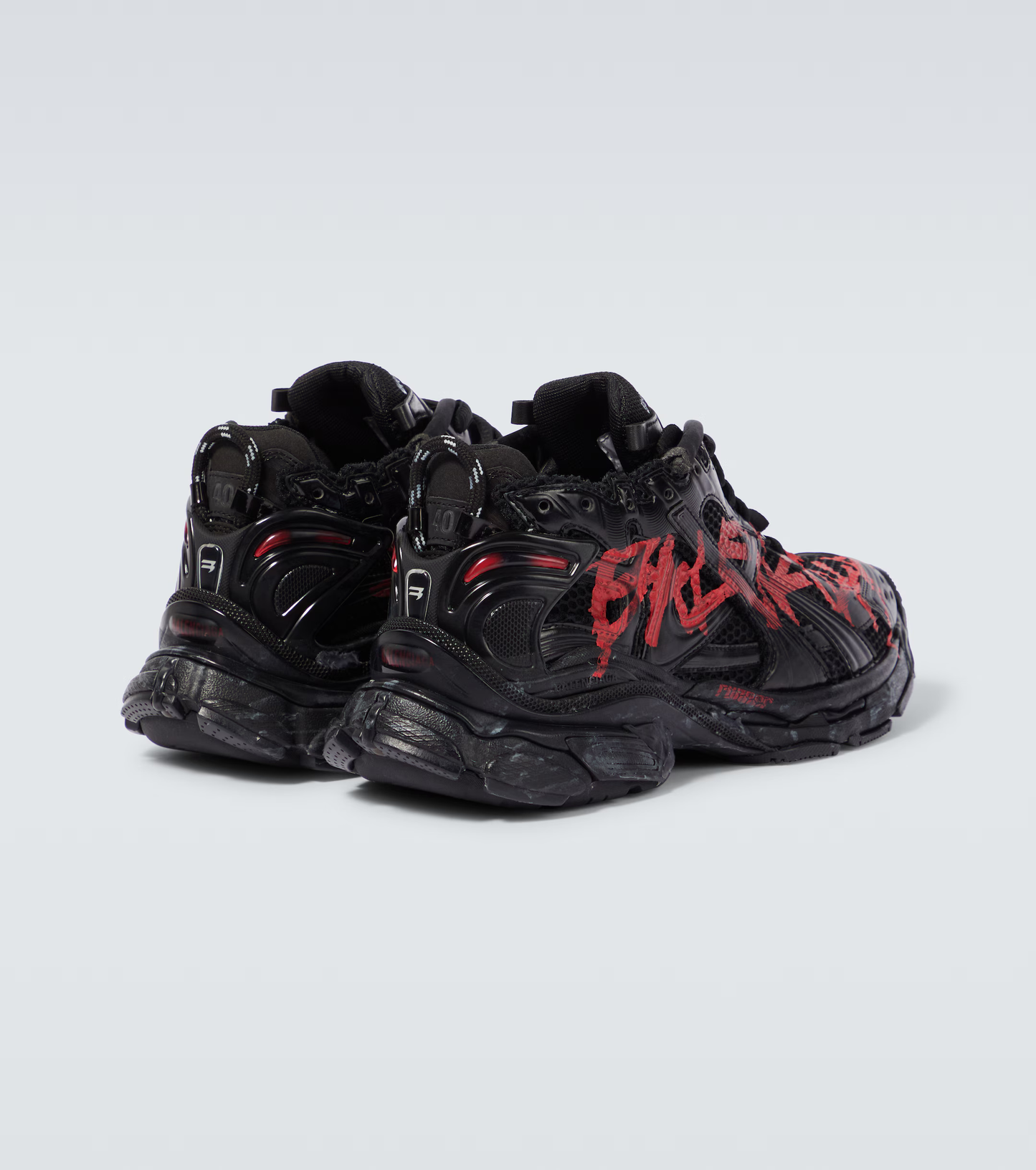distressed black & red mesh runner sneakers
vintage luxury style running shoes
grey deconstructed street sneakers
balenciaga inspired runners