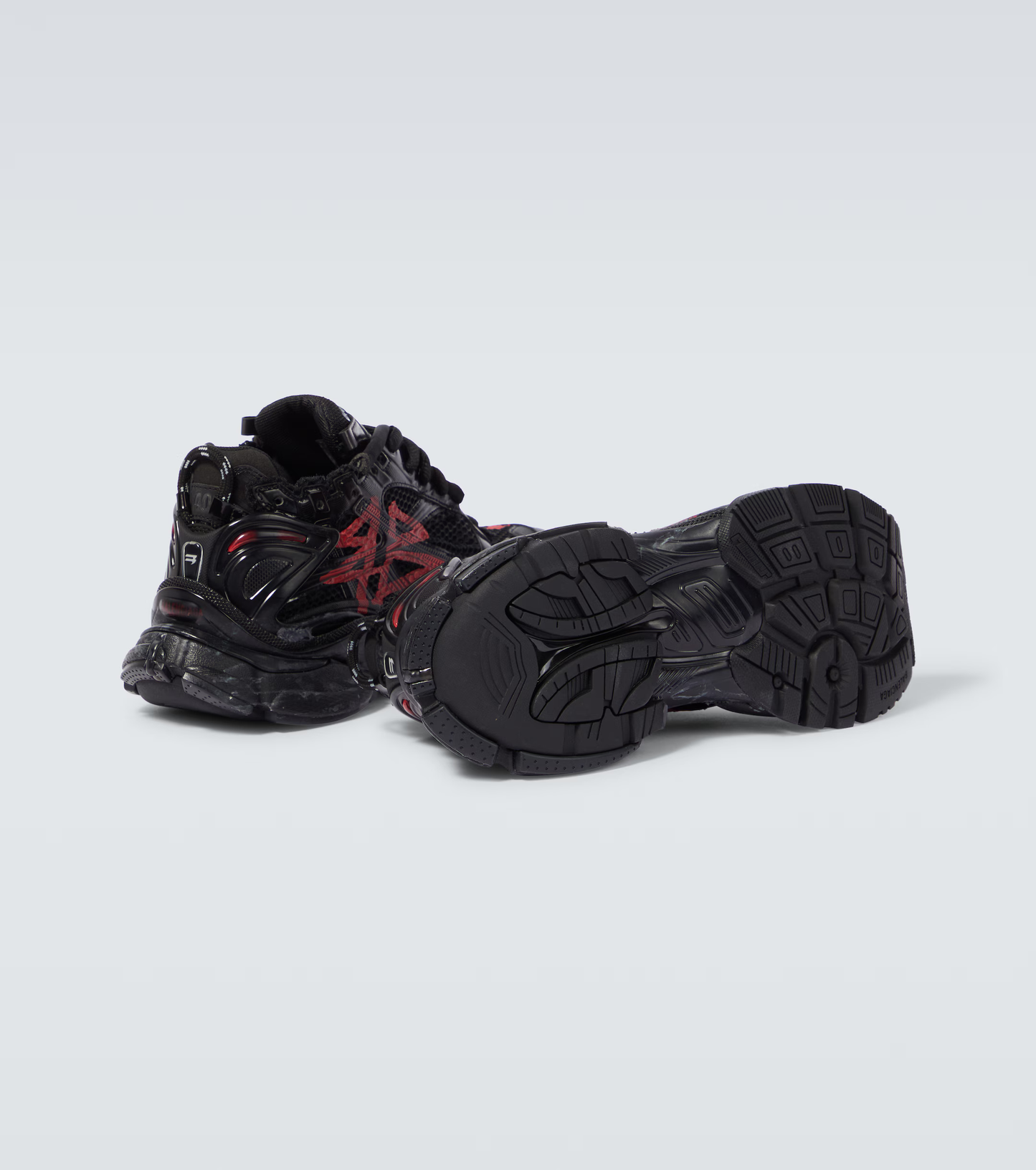 distressed black & red mesh runner sneakers
vintage luxury style running shoes
grey deconstructed street sneakers
balenciaga inspired runners