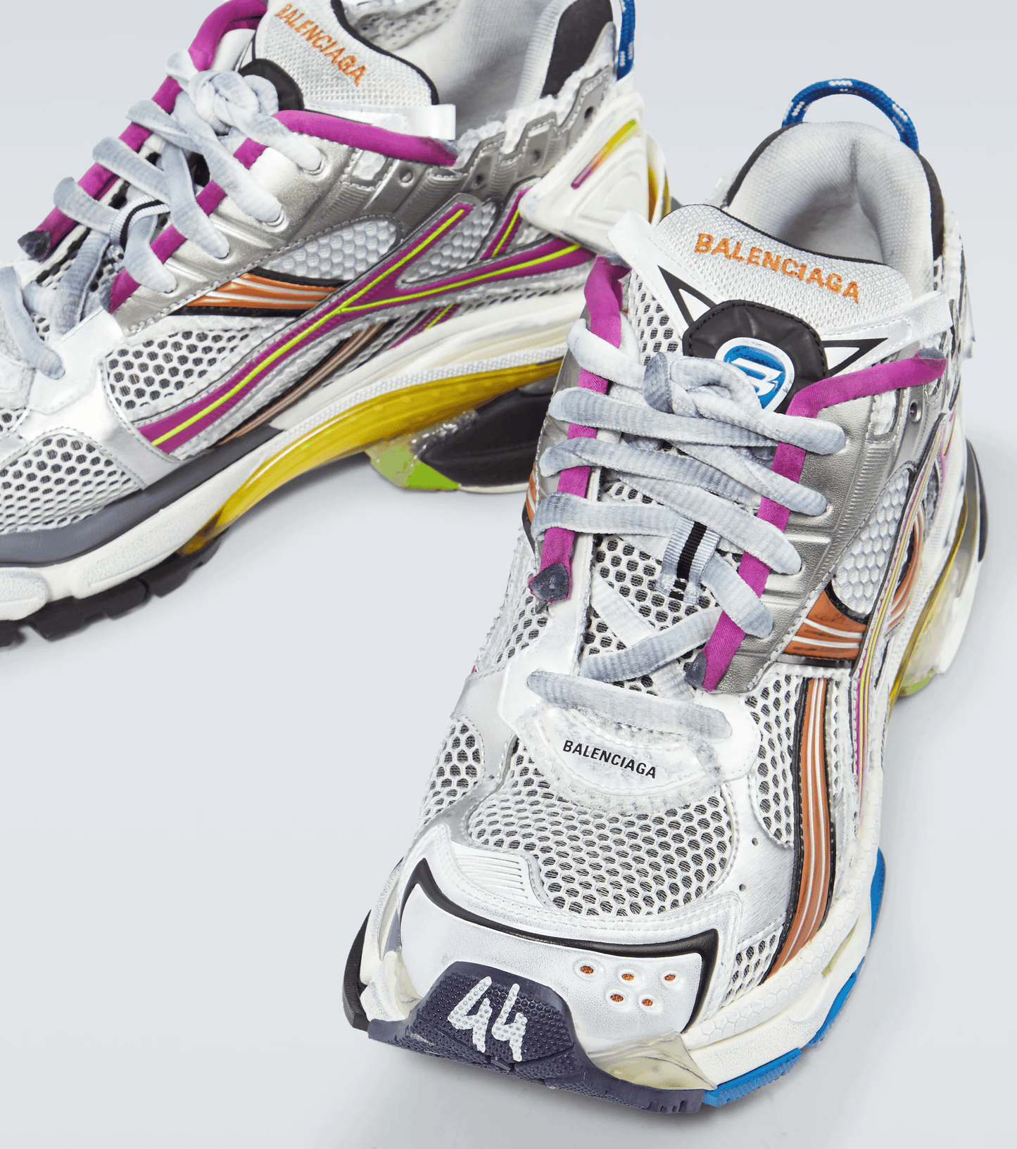 distressed rainbow mesh runner sneakers
vintage luxury style running shoes
grey deconstructed street sneakers
balenciaga inspired runners