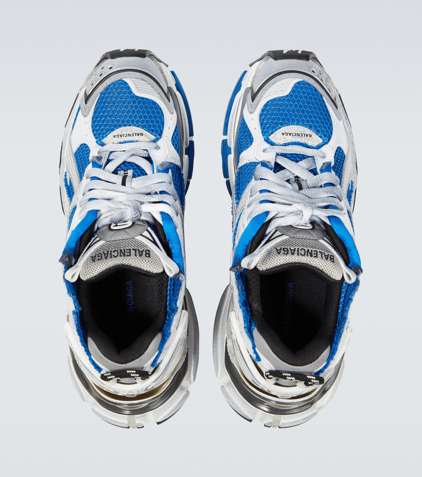 distressed white & blue mesh runner sneakers
vintage luxury style running shoes
grey deconstructed street sneakers
balenciaga inspired runners