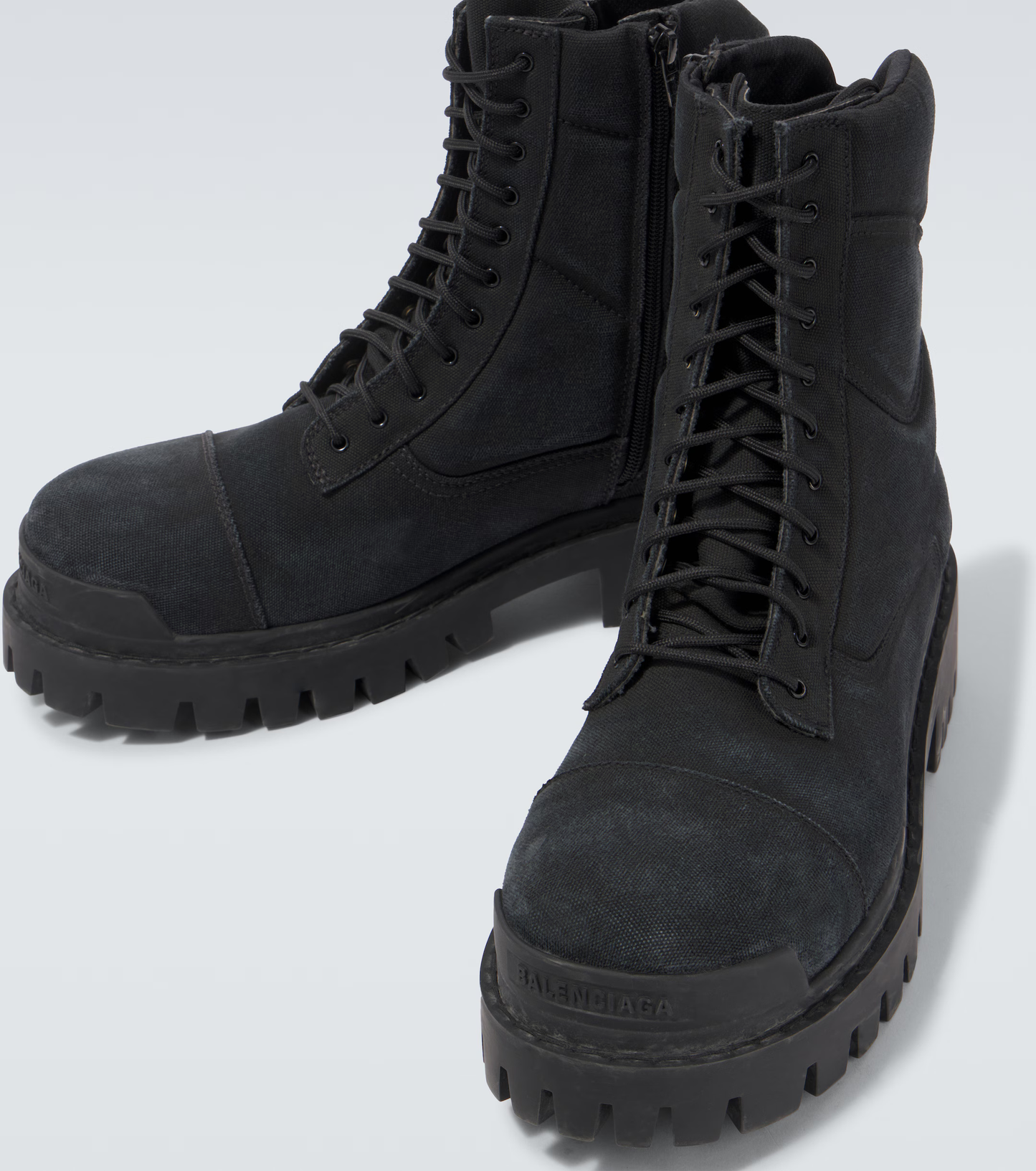 platform combat boots black
chunky sole lace-up boots
Balenciaga strike inspired heavy boots
urban utility black fashion boots