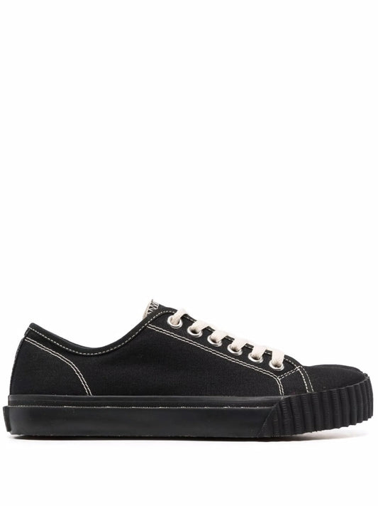 black split-toe tabi sneakers

low top avant-garde sneakers

maison margiela tabi inspired shoes

artisan minimalist streetwear sneakers