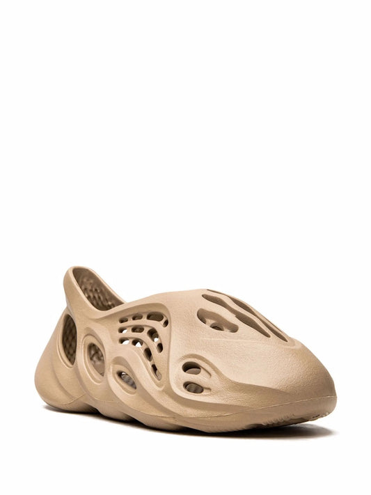 Mist foam runner sneaker

earth tone eva streetwear shoe

yeezy style foam slip-on clog

void worldwide futuristic foam runner
