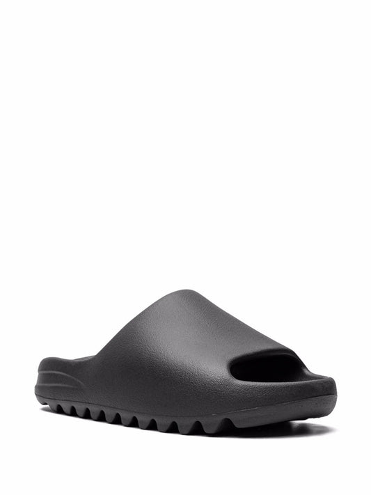 Yeezy Slide Onyx Black minimalist slipper

Adidas Yeezy black foam slides

Kanye West Onyx EVA slide sandals

Streetwear slip-ons VOID Worldwide