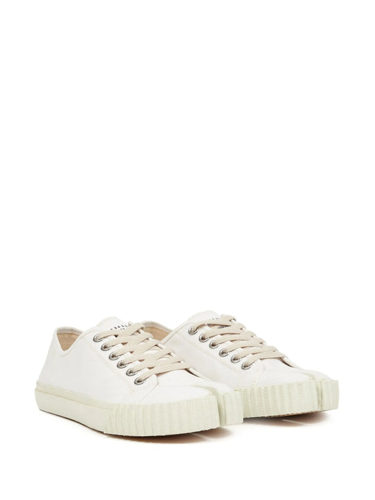 white split-toe tabi sneakers

low top avant-garde sneakers

maison margiela tabi inspired shoes

artisan minimalist streetwear sneakers
