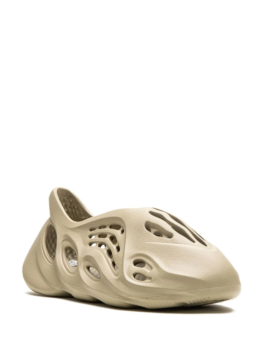 Onyx foam slip-on sneaker

Stone Salt yeezy style eva runner

lightweight futuristic foam clog

void worldwide sculpted slip-ons