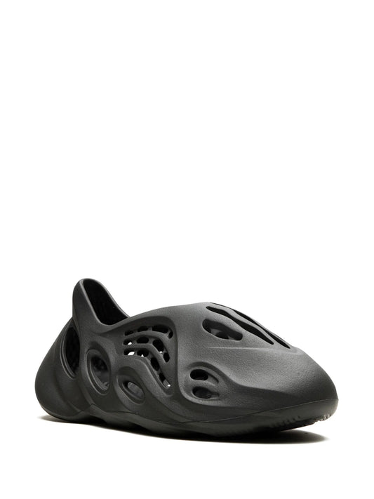 Onyx foam slip-on sneaker

black yeezy style eva runner

lightweight futuristic foam clog

void worldwide sculpted slip-ons