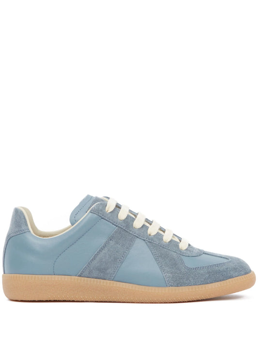 blue german army trainers sneakers

retro maison margiela style shoes

luxury suede panelled trainers

leather minimalist sneakers void packaging