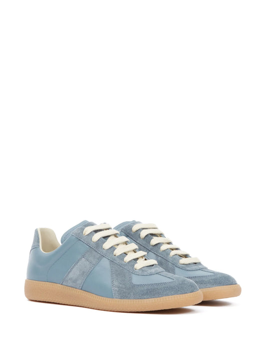 blue german army trainers sneakers

retro maison margiela style shoes

luxury suede panelled trainers

leather minimalist sneakers void packaging
