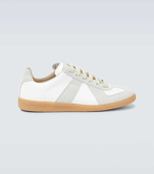 cream german army trainers sneakers

retro maison margiela style shoes

luxury suede panelled trainers

leather minimalist sneakers void packaging
