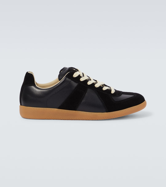 black & orange german army trainers sneakers

retro maison margiela style shoes

luxury suede panelled trainers

leather minimalist sneakers void packaging