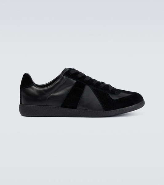 black german army trainers sneakers

retro maison margiela style shoes

luxury suede panelled trainers

leather minimalist sneakers void packaging