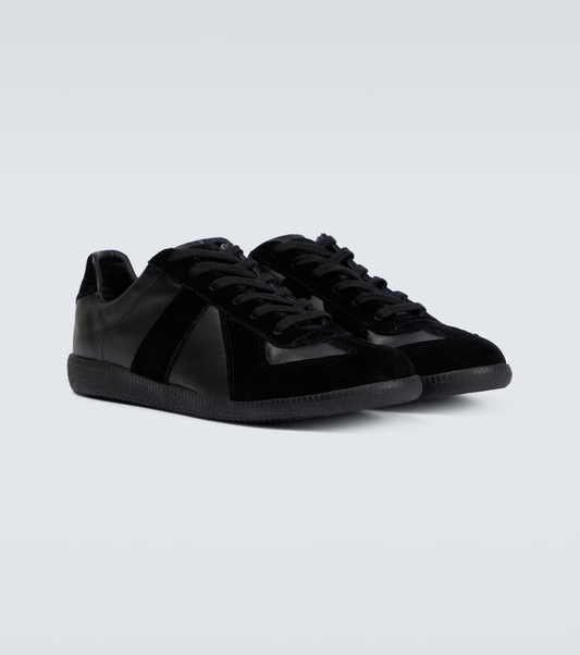 black german army trainers sneakers

retro maison margiela style shoes

luxury suede panelled trainers

leather minimalist sneakers void packaging