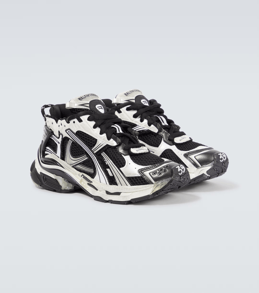 distressed white & black mesh runner sneakers

vintage luxury style running shoes

grey deconstructed street sneakers

balenciaga inspired runners