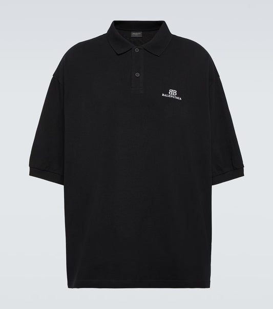 oversized cotton piqué polo
luxury streetwear polo shirt
high fashion oversized polo
premium black polo shirt
balenciaga inspired casualwear