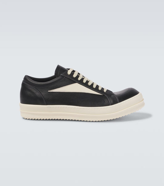 hollywood lace up low sneakers

rick owens vans inspired canvas shoes

black milk low-top designer sneaker

elongated lace streetwear shoe