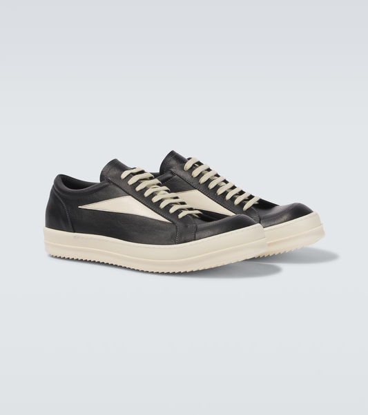 hollywood lace up low sneakers

rick owens vans inspired canvas shoes

black milk low-top designer sneaker

elongated lace streetwear shoe