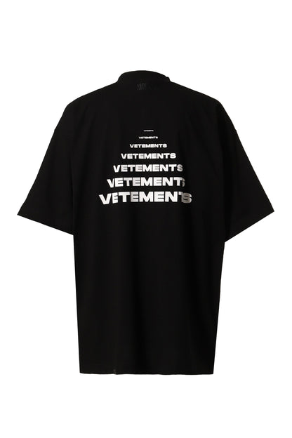 black oversized statement tee
high fashion streetwear shirt
vetements style t-shirt
premium cotton oversized shirt
bold graphic fashion tee