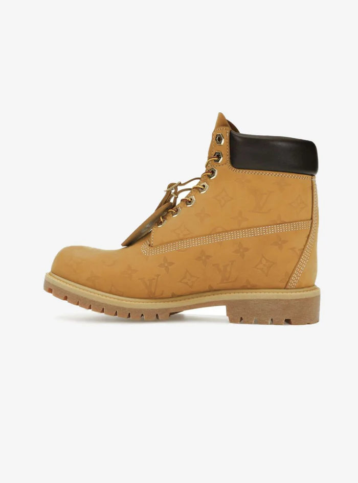 Monogram wheat 6-inch boots

luxury timberland style brown boots

designer waterproof ankle boots

high-end embossed streetwear boots

Louis Vuitton x Timberland 6" Ankle Boot Monogram Brown Wheat