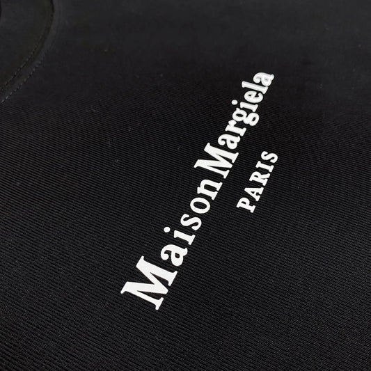 Black Maison Margiela inspired deconstructed tee

minimalist boxy fit shirt off white

avant-garde cotton t-shirt VOID WORLDWIDE

distressed fashion tee streetwear